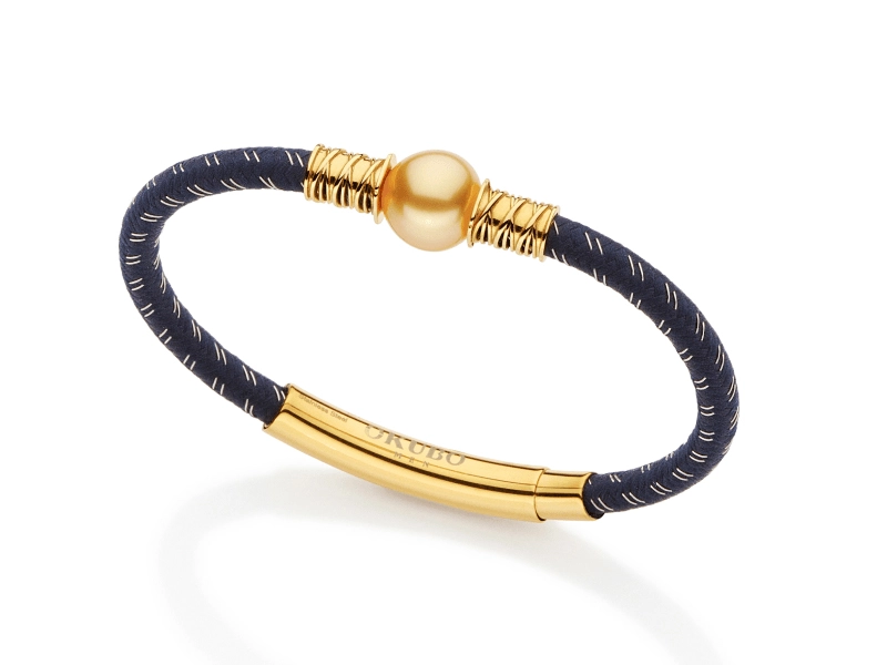 Joia masculina Menuki South Sea Golden com pérola dourada cultivada e design inspirado na tradição japonesa.